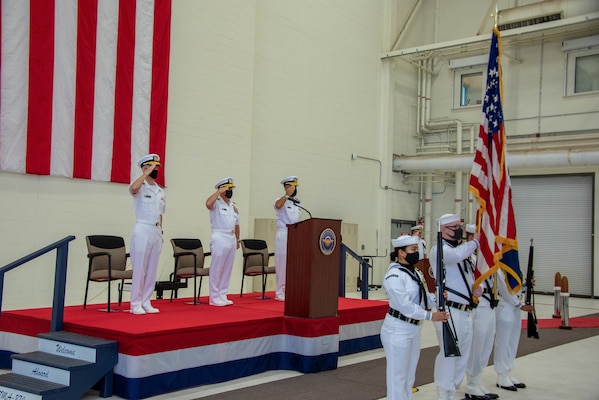 Chief of Naval Operations Adm. Mike Gilday, center, presides over the Naval Air Systems Command change of command ceremony Sep. 9 at Naval Air Station Patuxent River, Maryland, with Vice Adm. Dean Peters, left, and Vice Adm. Carl Chebi, right.
