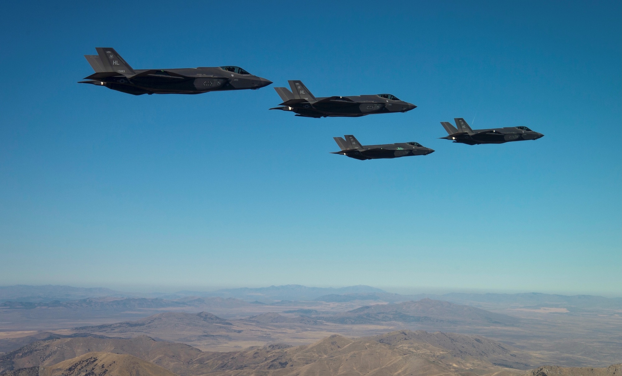 Image of four F-35s in flight