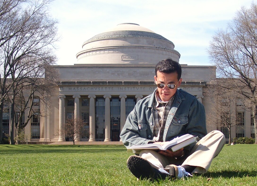 Capt. Edwin Gomez, commander of the 470th Quartermaster Company (Brigade Aerial Delivery Support Company), studies while at the Massachusetts Institute of Technology in the mid-2000s. After immigrating to the United States, Gomez earned advanced degrees at the prestigious university in hopes of fulfilling his childhood dream of becoming an astronaut. (Courtesy photo provided by Capt. Edwin R. Gomez)