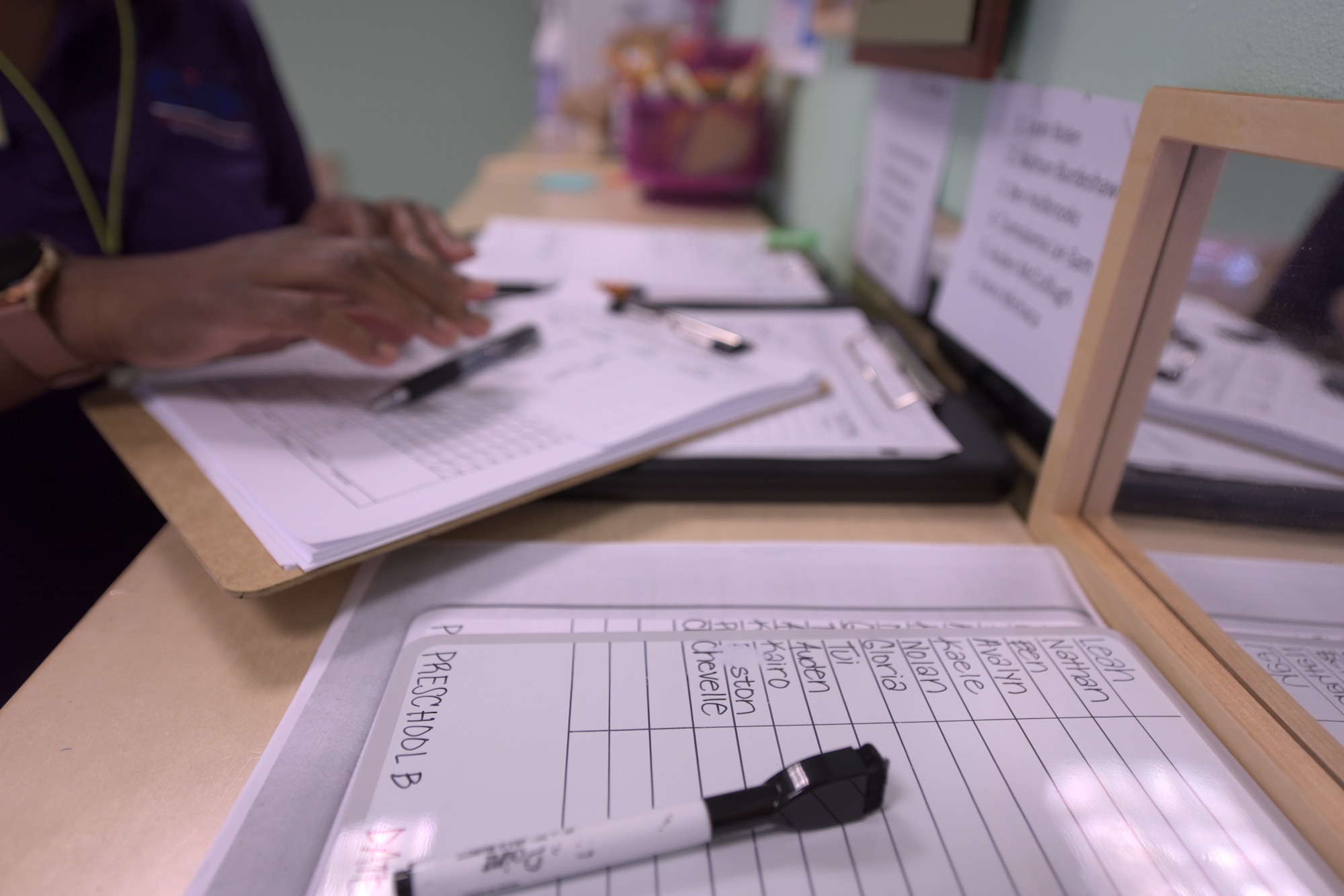 Woman completes paperwork