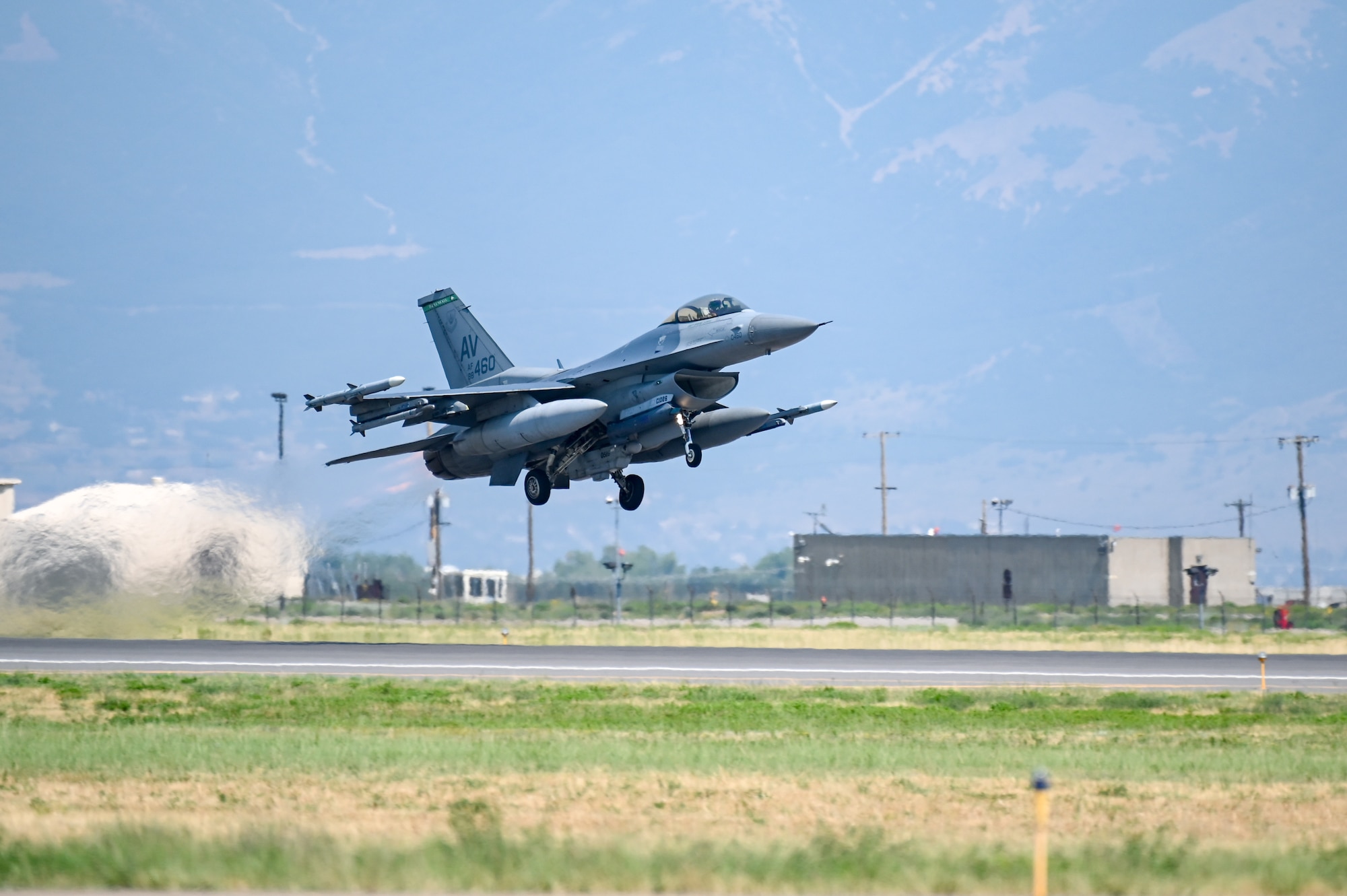 An F-16 Fighting Falcon assigned to the 31st Fighter Wing from Aviano Air Base, Italy, takes off Aug. 25, 2021, at Hill Air Force Base, Utah. The wing was participating in a Weapons System Evaluation Programs, known as Combat Hammer and Combat Archer, which tests and validates the performance of crews, pilots, and their technology while deploying air-to-air and air-to-ground munitions. (U.S. Air Force photo by Cynthia Griggs)