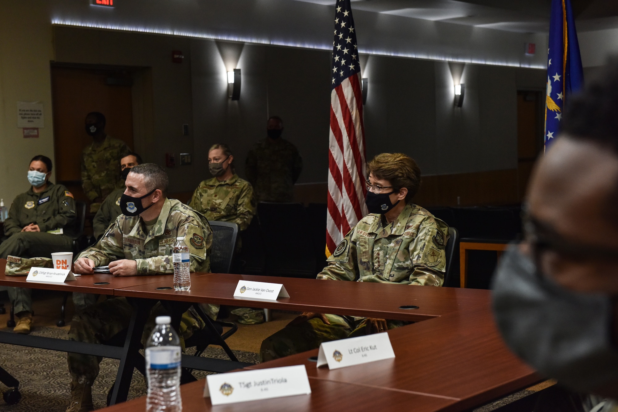 U.S. Air Force Gen. Jacqueline D. Van Ovost, Air Mobility Command commander, and Chief Master Sgt. Brian Kruzelnick, AMC command chief, speak with 305th Air Mobility Wing Airmen about their experiences participating in Operation Allies Refuge during a visit to Joint Base McGuire-Dix-Lakehurst, N.J., Sept. 8, 2021. 305th AMW crews were instrumental to the Operation Allies Refuge mission and were among the first to help evacuate. (U.S. Air Force Photo by Staff Sergeant Shay Stuart)