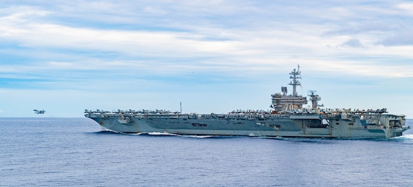 The Nimitz-class aircraft carrier USS Carl Vinson (CVN 70) launches aircraft as it transits through the South China Sea, Sept. 7, 2021.