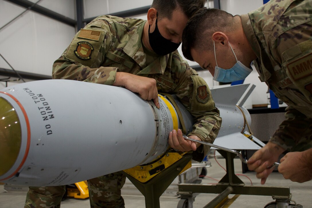 Airmen assigned to the 31st Fighter Wing from Aviano Air Base, Italy, test an AGM-65 Maverick making sure all the components within the missile are functional prior to being loaded on the aircraft Aug. 19, 2021. These crews are evaluated as part of the Weapons System Evaluation Program, which tests and validates the performance of crews and their technology while deploying munitions. (U.S. Air Force photo by 1st Lt Lindsey Heflin)