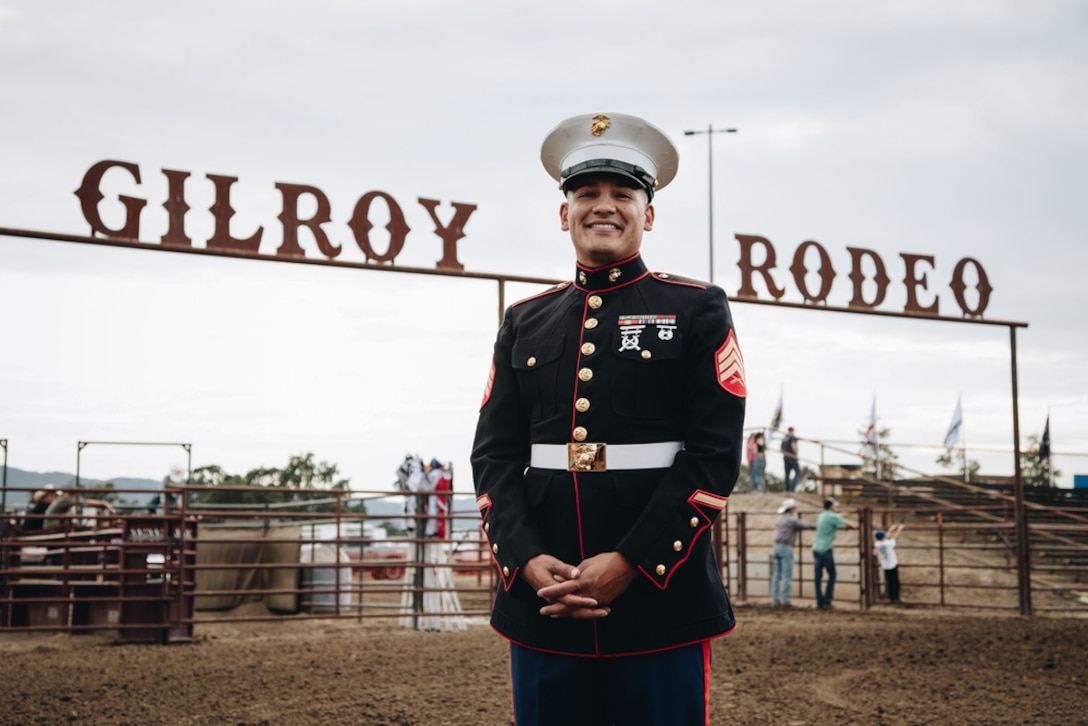 U.S. Marine Corps Sgt. Eric Morales, a recruiter with Recruiting Sub-Station Gilroy, Recruiting Station San Francisco, poses for a photo at the Gilroy Rodeo in Gilroy, California August 13, 2021. The Marines of RSS Gilroy hosted a pull-up challenge and talked to rodeo attendees interested in learning more about the opportunities available within the Marine Corps. (U.S. Marine Corps illustration by Sgt. Alina Thackray)
