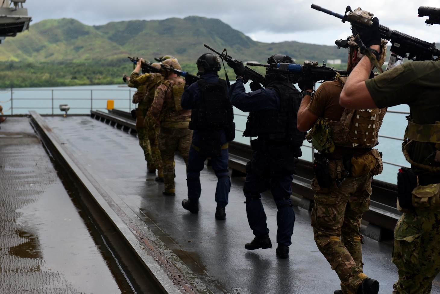 U.S. Naval special warfare operators and Japan Maritime Self-Defense Force sailors train aboard USS Frank Cable (AS-40) during MALABAR 2021.