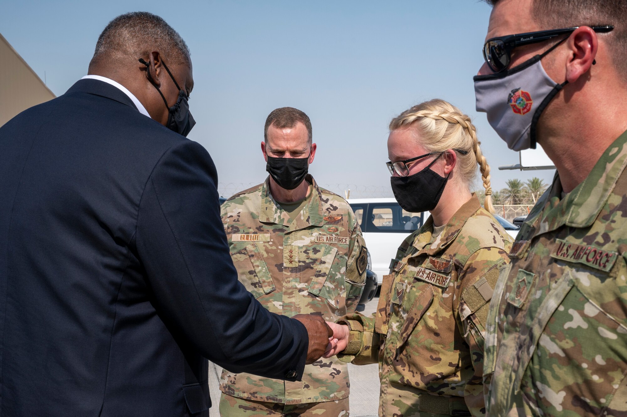 Secretary of Defense Lloyd J. Austin III coins a service member for their support to the Afghanistan evacuation operations Sept. 07, 2021, at Al Udeid Air Base, Qatar.