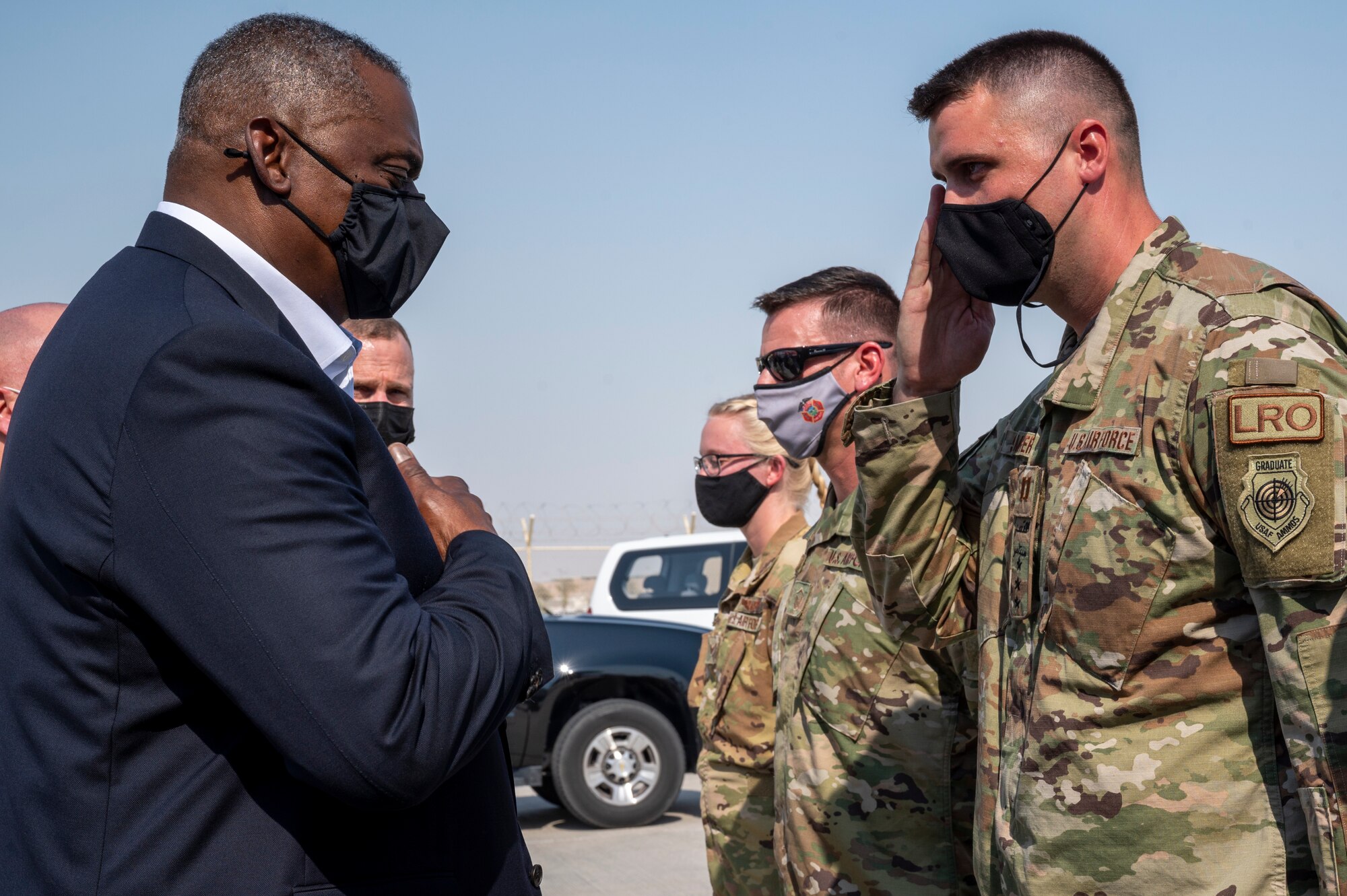 Secretary of Defense Lloyd J. Austin III coins a service member for their support to the Afghanistan evacuation operations Sept. 07, 2021, at Al Udeid Air Base, Qatar.