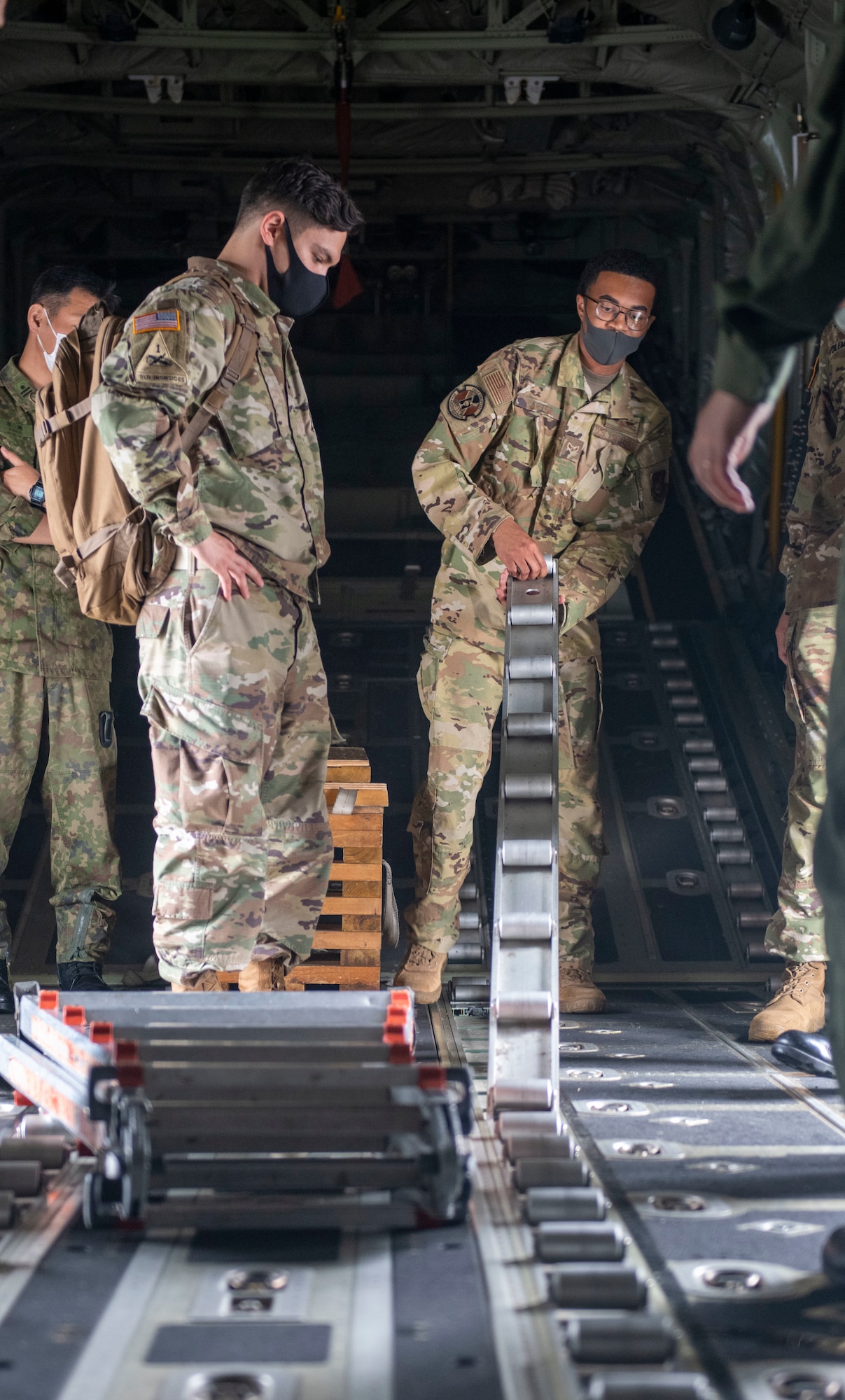A U.S. Air Force Airman demonstrates the capabilities of a C-130J Super Hercules