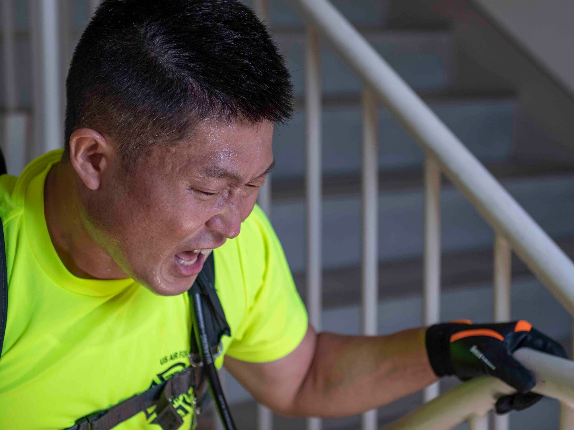 A participant runs up a flight of stairs during the 10th annual Yokota Fire Emergency 9/11 Tower Run at Yokota Air Base, Japan, Sept. 10, 2021.