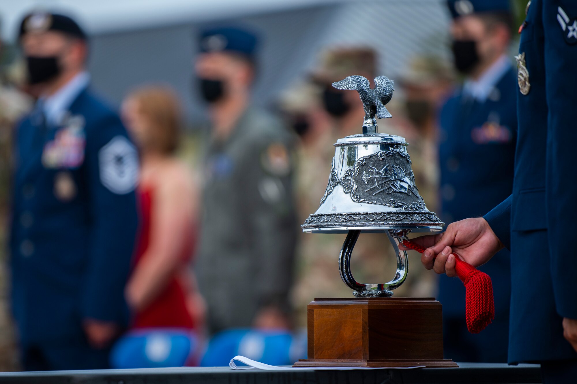 Military member in uniform rings a bell.