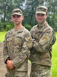 Maj. Andre Slonopas, right, commander of the Virginia National Guard's 134th Cyber Security Company, 124th Cyber Protection Battalion, 91st Cyber Brigade, proudly shows off his Ranger tab following the completion of the U.S. Army Ranger School in July 2021 at Fort Benning, Georgia. Slonopas, who began his career as an engineer officer with the Fredericksburg-based 116th Brigade Special Troops Battalion, switched to the Fairfax-based Data Processing Unit in 2014 and became one of the staff officers instrumental in standing up the 91st Cyber Brigade.