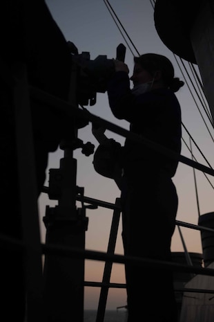 (Sept. 8, 2021) Cryptologic Technician (Collection) 3rd Class Perrissa Bessent looks out from bridge-wing aboard the Arleigh Burke-class guided-missile destroyer USS Arleigh Burke (DDG 51), Sept. 8, 2021. Arleigh Burke, forward-deployed to Rota, Spain, is on its first patrol in the U.S. Sixth Fleet area of operations in support of U.S. national security interests and regional allies and partners in Europe and Africa.