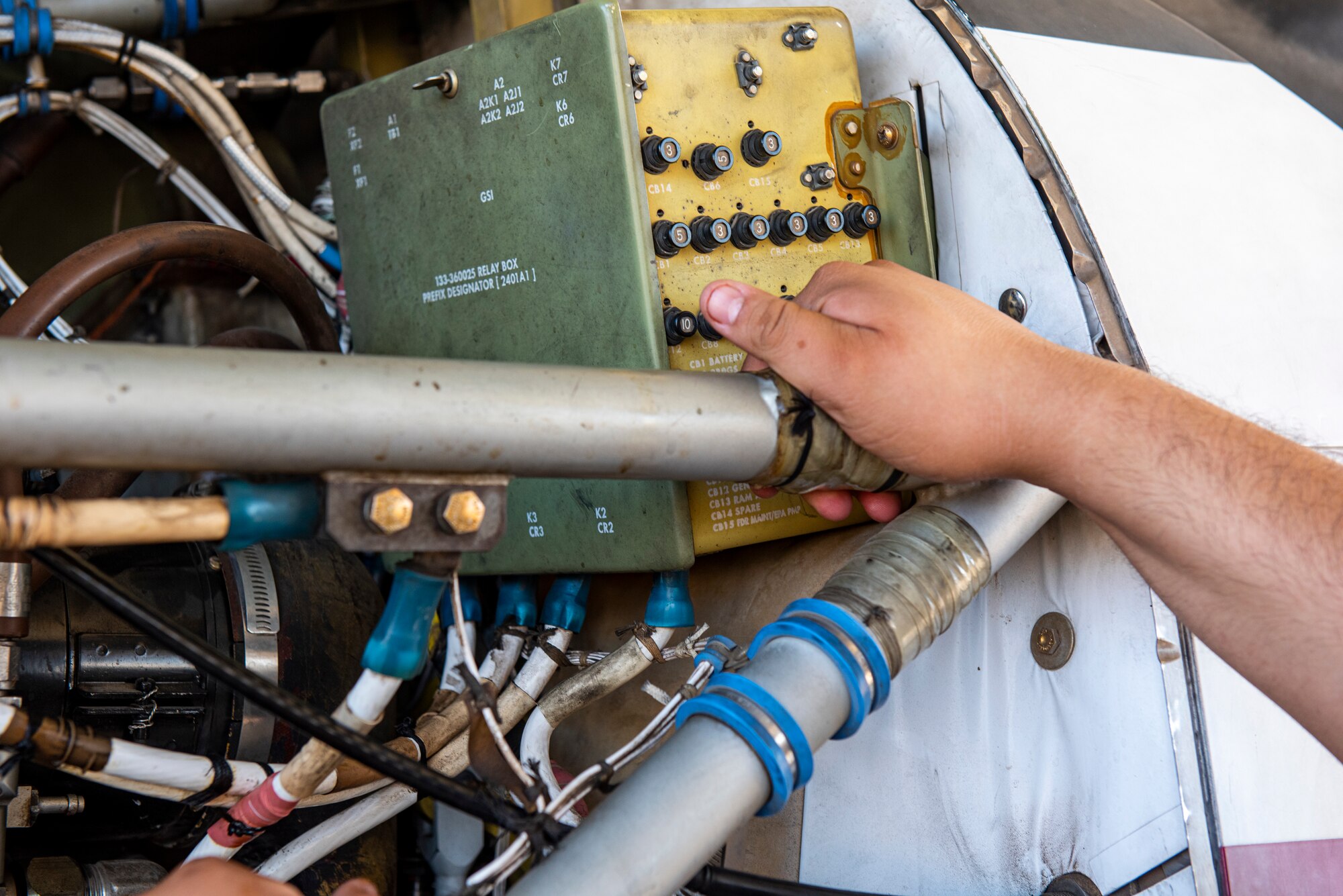 Jerry Martinez, 47th 47th Flying Maintenance Directorate aircraft mechanic, examines the engine of a Texan II T-6 aircraft to ensure it is suitable for flight, at Laughlin Air Force Base, Texas on Sept. 8, 2021. National Hispanic Heritage Month is a period from September 15 to October 15 in the United States for recognizing the contributions and influence of Hispanic Americans to the history, culture, and achievements of the United States.