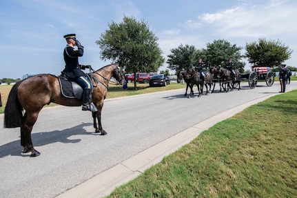 Soldiers with the Fort Sam Houston Caisson Section carry the flag-draped remains of Col. Richard E. Cole during his interment ceremony, Sept. 7, 2021 at the Fort Sam Houston National Cemetery.