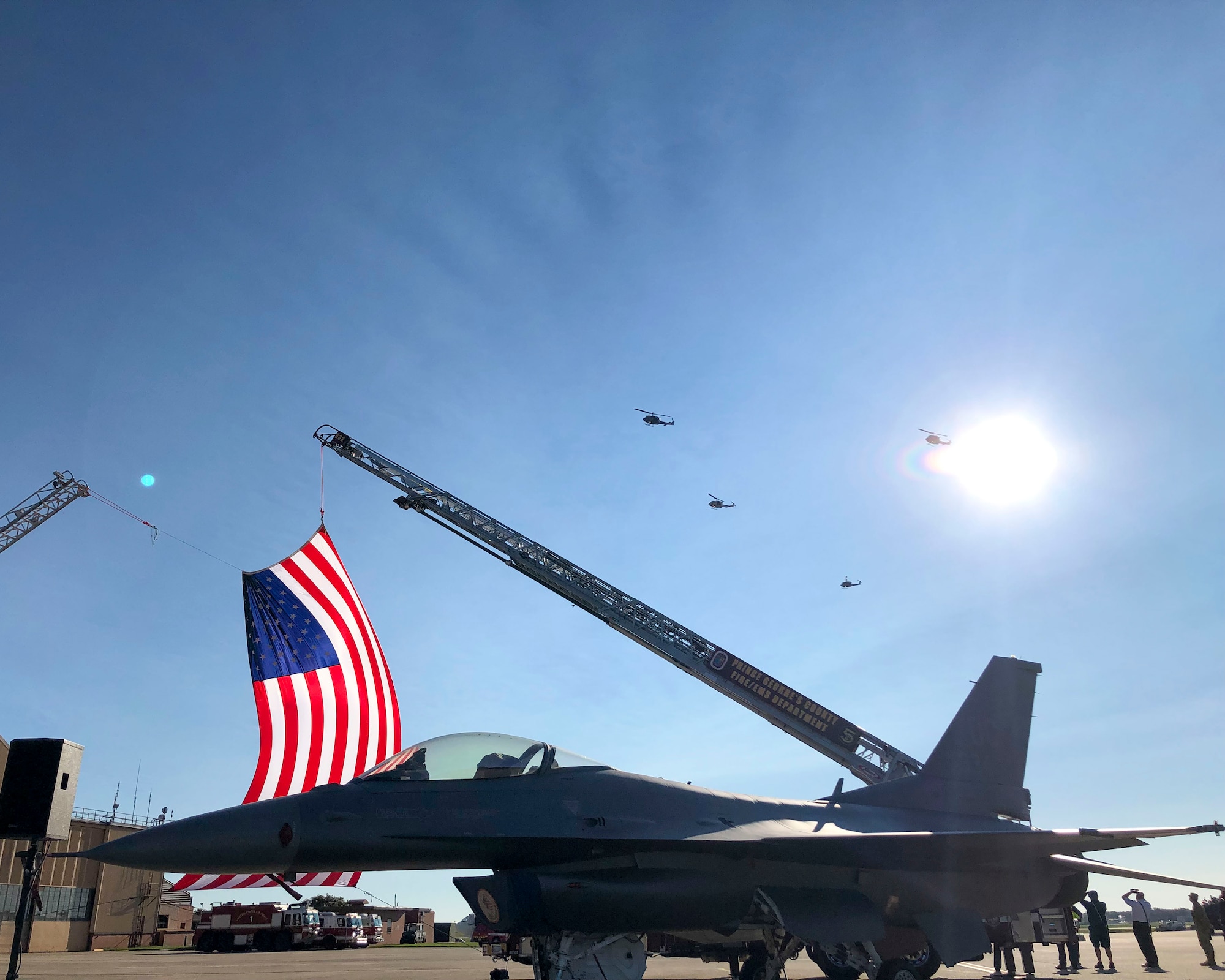A flight of four 1st Helicopter Squadron UH-1N Hueys conduct a flyover during the 9/11 Remembrance Ceremony held at Joint Base Andrews, Md., on Sept. 10, 2021.