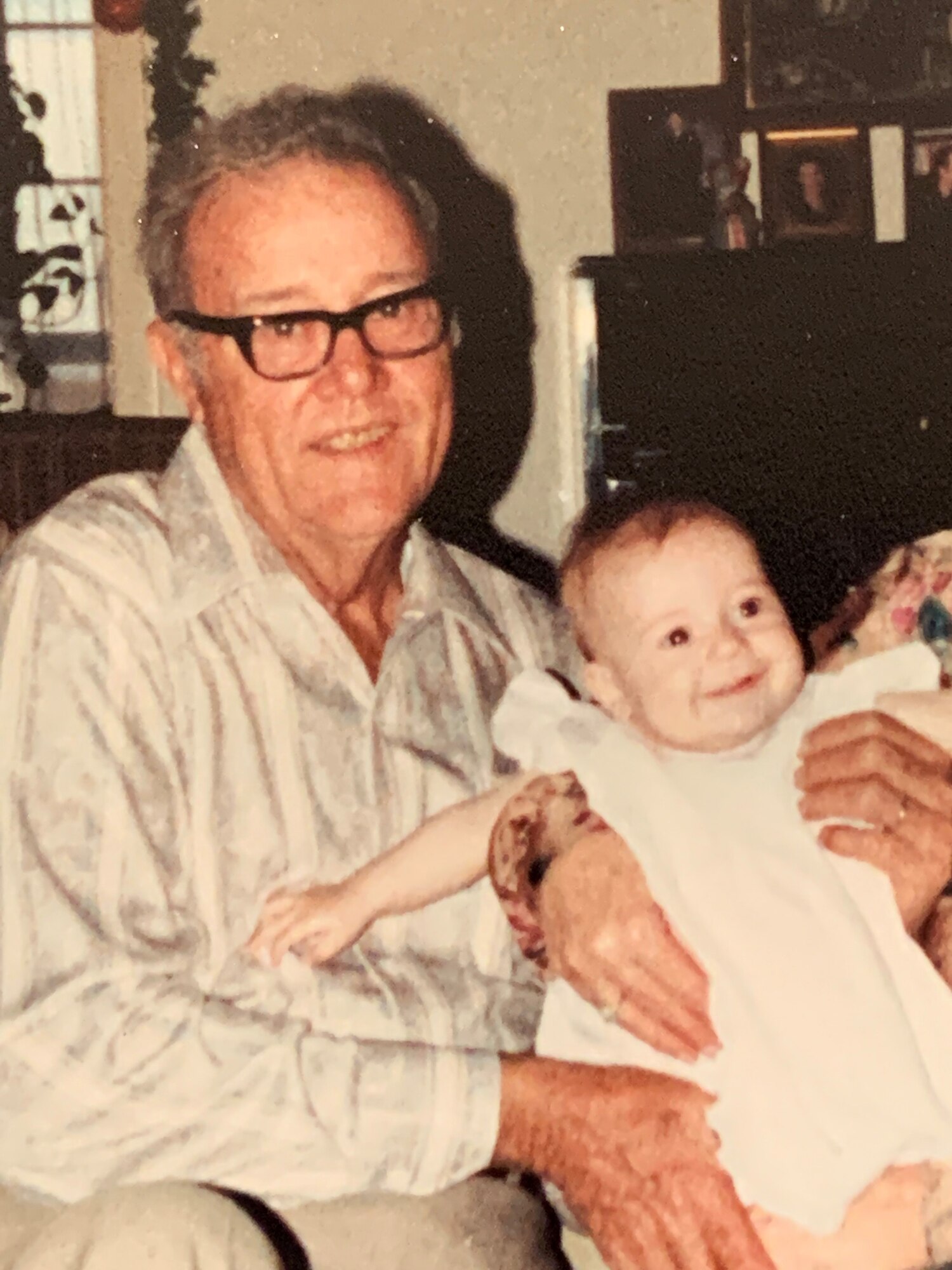 Col Carleton poses with is grandaughter