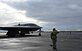 Staff Sgt. Ian Simms, 110th Expeditionary Bomb Squadron dedicated crew chief, prepares a B-2 Spirit stealth bomber for departure from Keflavik Air Base, Iceland, Sept. 8, 2021. The stealth bombers integrated with Royal Norwegian Air Force F-35A Lightning II enhancing bomber interoperability with partners and allied nations. (U.S. Air Force photo by Airman 1st Class Victoria Hommel)