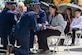 Air Force Honor Guard members fold the U.S. flag during the interment of retired Col. Richard E. Cole.