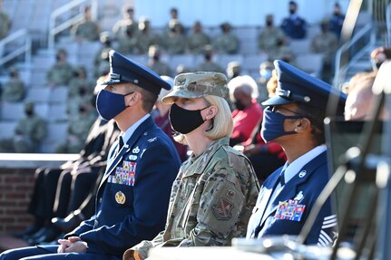 The 11th Wing and Joint Base Anacostia-Bolling Vice Commander Col. Erica Rabe observes a 9/11 memorial ceremony with her teammates Col. Mike Zuhlsdorf, commander, and Command Chief Master Sgt. Christy Peterson on Sept. 10, 2021. Mission partners from across the National Capitol Region gathered at JB Anacostia-Bolling to honor those who died 20 years ago during the terror attacks on the World Trade Center and the Pentagon on September 11, 2001. (U.S. Air Force photo by Staff Sgt. Kayla White)