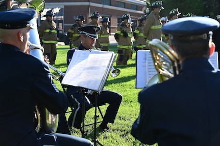 U.S. Air Force Tech. Sgt. Jason Covey plays with other members of The United States Air Force Band during a 9/11 memorial ceremony on Sept. 10, 2021 at Joint Base Anacostia-Bolling, Washington D.C. Mission partners from across the National Capitol Region gathered at JB Anacostia-Bolling to honor those who died 20 years ago during the terror attacks on the World Trade Center and the Pentagon on September 11, 2001. (U.S. Air Force photo by Staff Sgt. Kayla White)