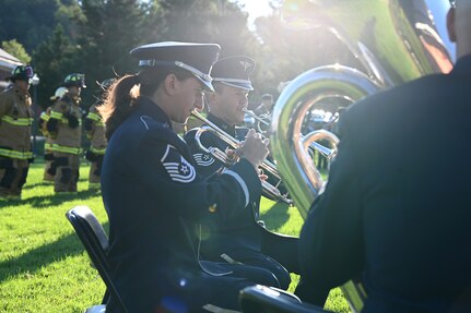 U.S. Air Force Tech. Sgt. Jason Covey plays with other members of The United States Air Force Band during a 9/11 memorial ceremony on Sept. 10, 2021 at Joint Base Anacostia-Bolling, Washington D.C. Mission partners from across the National Capitol Region gathered at JB Anacostia-Bolling to honor those who died 20 years ago during the terror attacks on the World Trade Center and the Pentagon on September 11, 2001. (U.S. Air Force photo by Staff Sgt. Kayla White)