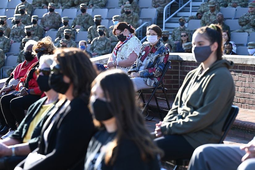 Surviving members of the Earhart family observe a 9/11 memorial ceremony at Joint Base Anacostia-Bolling, Washington D.C. on Sept. 10, 2021. The Earhart and Golinski families attending the ceremony both lost loved ones during the terrorist attack on the Pentagon twenty years ago. Mission partners from across the National Capitol Region gathered at JB Anacostia-Bolling to honor those who died during the terror attacks on the World Trade Center and the Pentagon on September 11, 2001. (U.S. Air Force photo by Staff Sgt. Kayla White)