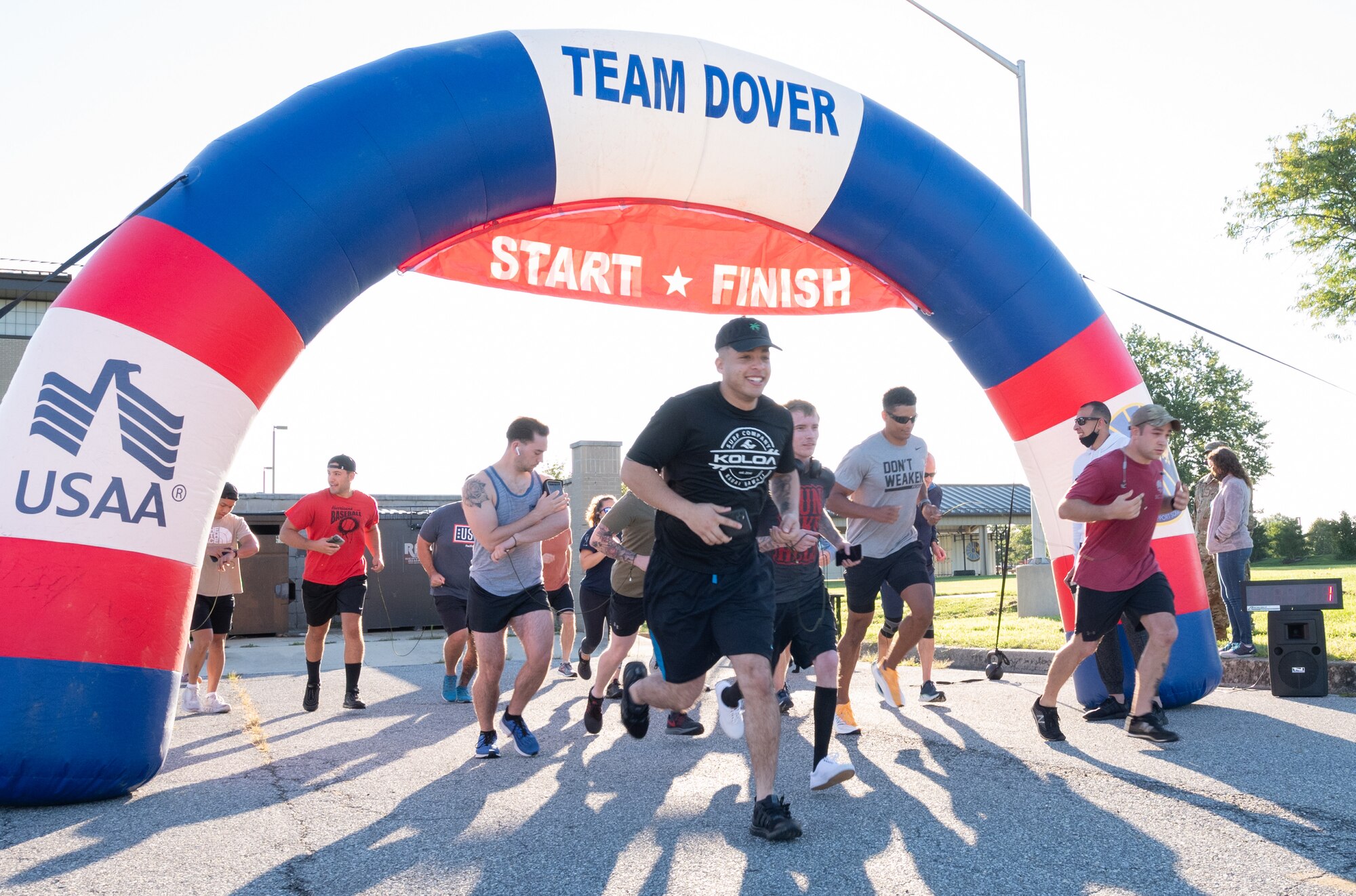 Runners leave the starting line at the “I’ve Got Your Six” 5k at Dover Air Force Base, Delaware, Sept. 10, 2021. Almost 30 Team Dover Airmen and civilians participated in the event. (U.S. Air Force photo by Mauricio Campino)