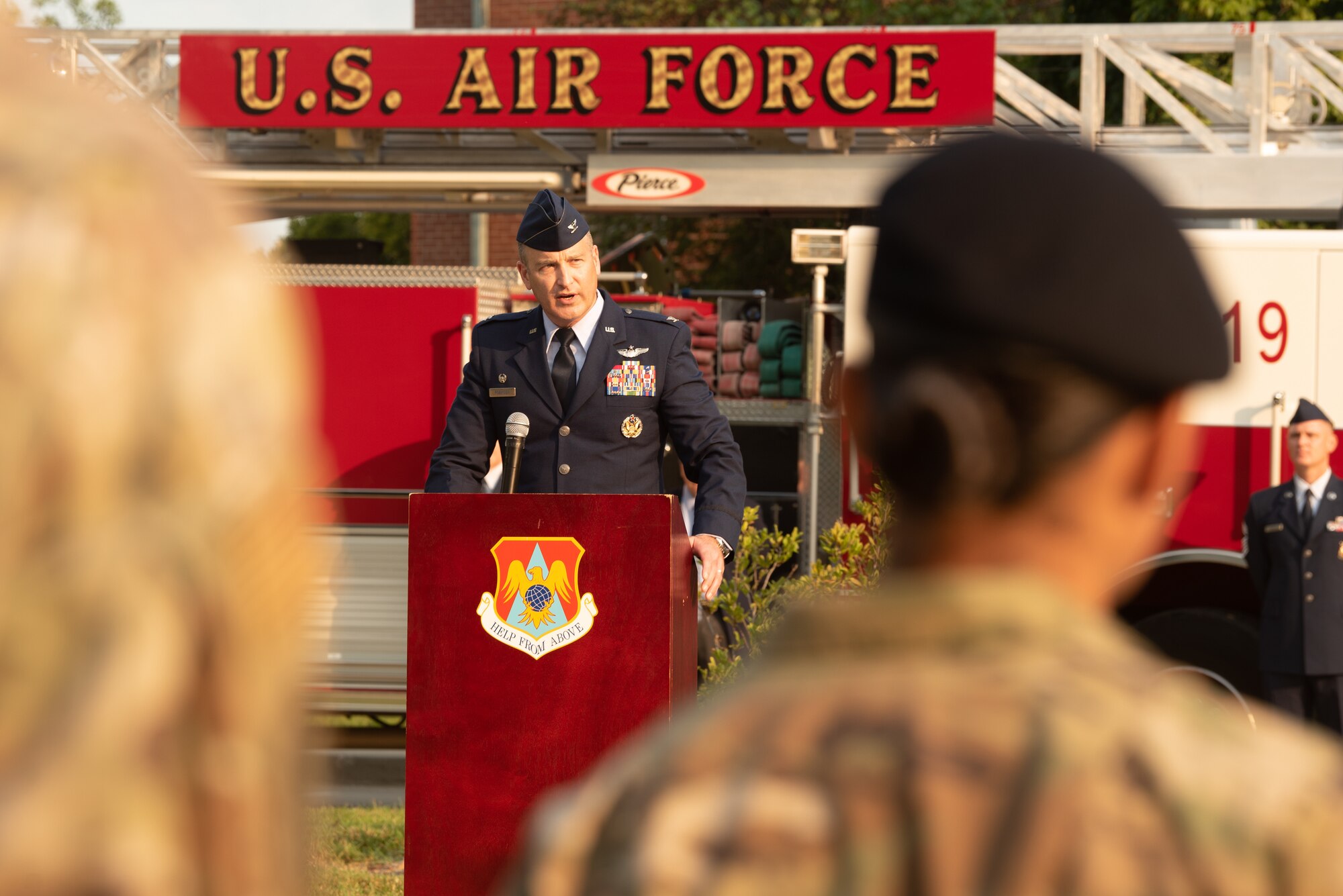 U.S. Air Force Col. Christopher Robinson, 375th Air Mobility Wing commander, addresses Airmen  during the 9/11 remembrance ceremony on Scott Air Force Base, Illinois, September 10, 2021. Military members, first responders and friends and family of Team Scott gathered to pay their respects and remember the lives lost during the terrorist attacks on September 11, 2001.(U.S. Air Force photo by Airman 1st Class Stephanie Henry)
