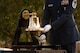 U.S. Air Force Master Sgt. Christopher McLaughlin, rings a bell at the 9/11 remembrance ceremony on Scott Air Force Base, Illinois, September 10, 2021. The bell is rung to honor first responders who have died in the line of duty, symbolizing the end of their duties. (U.S. Air Force photo by Airman 1st Class Stephanie Henry)