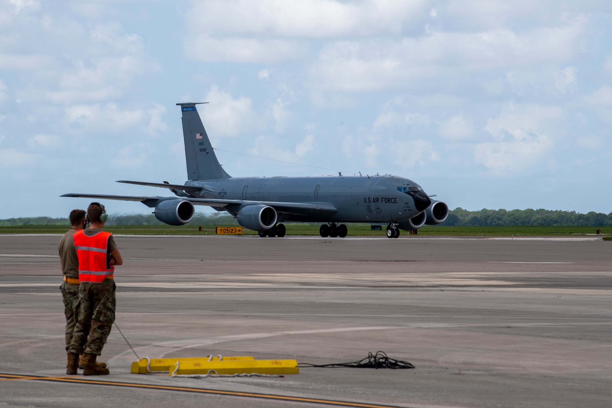 Airmen from the 6th Aircraft Maintenance Squadron marshal in a KC-135 Stratotanker aircraft at MacDill Air Force Base, Florida, Sept. 8, 2021.