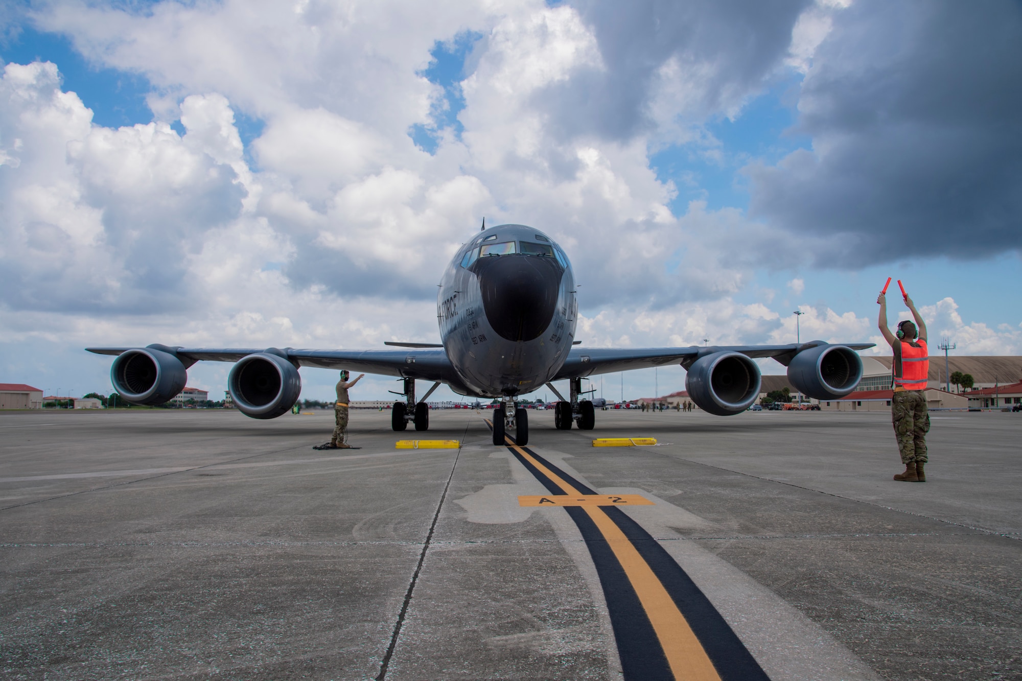 Airmen from the 6th Aircraft Maintenance Squadron marshal in a KC-135 Stratotanker aircraft at MacDill Air Force Base, Florida, Sept. 8, 2021.