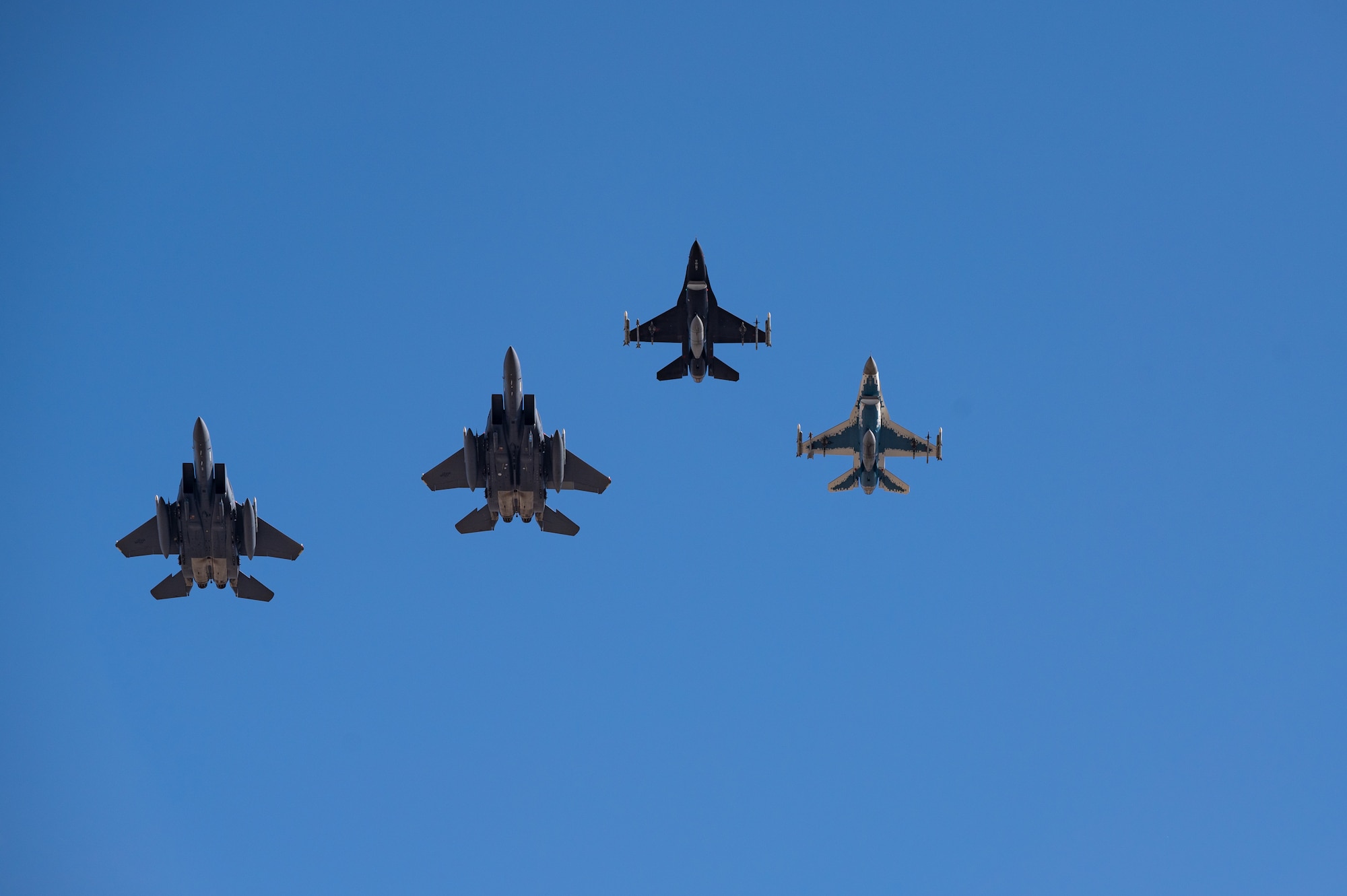 two pairs of airplanes flying