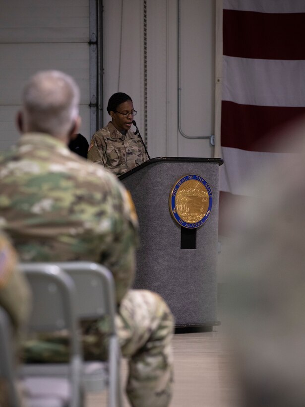 Master Sgt. Melissa Branch, the Alaska Army National Guard religious affairs noncommissioned officer, recounts her story during a Sept. 11 remembrance ceremony held on Joint Base Elmendorf-Richardson one day before the 20th anniversary of the events that transpired in 2001. (Army National Guard photo by Spc. Grace Nechanicky)