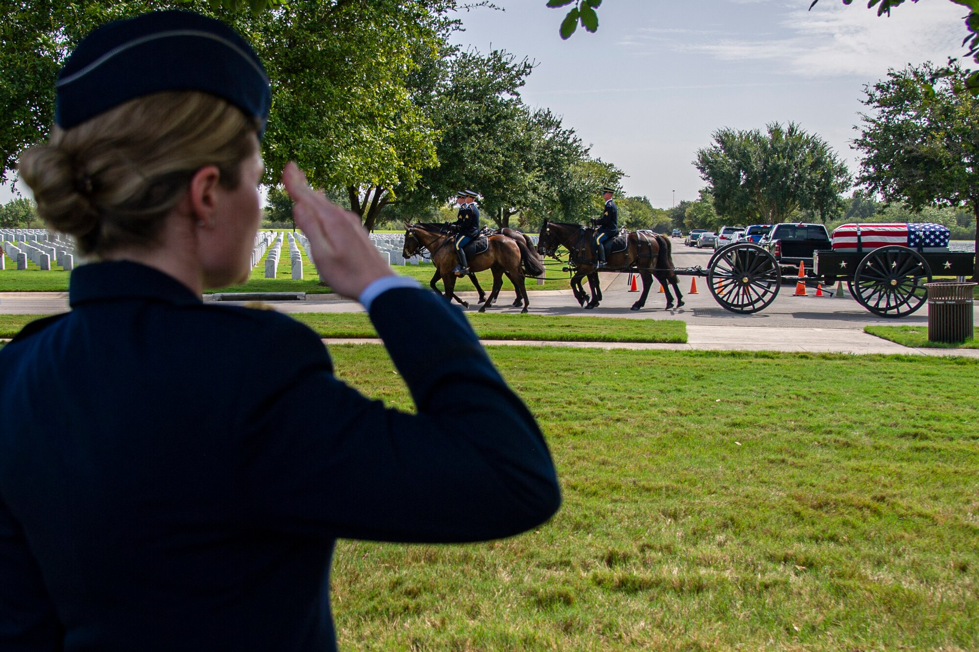 Soldiers with the Fort Sam Houston Caisson Section carry the flag-draped remains of Col. Richard E. Cole during his interment ceremony, Sept. 7, 2021.