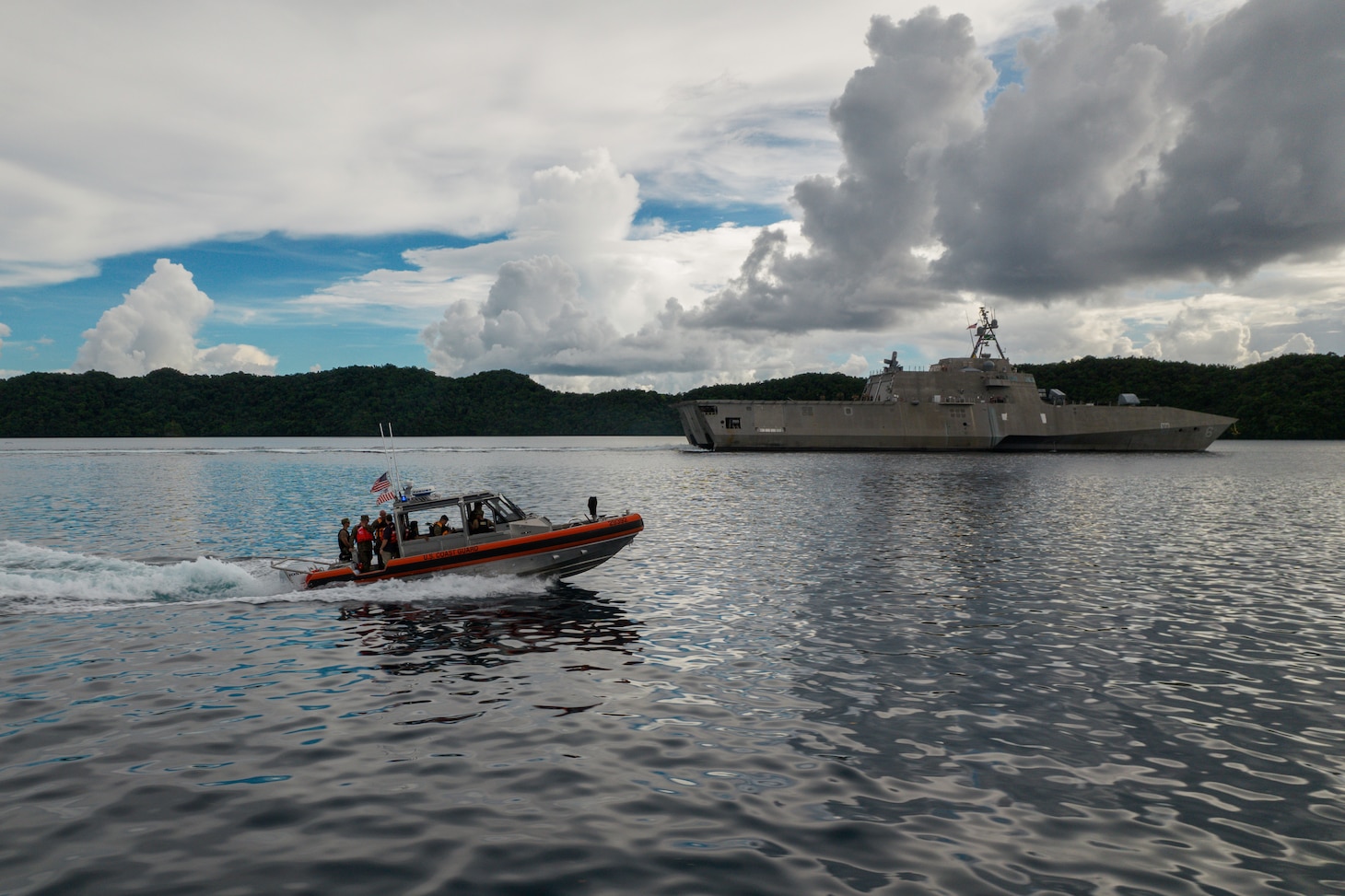 U.S. Marines and U.S. Coastguardsmen with Task Force Koa Moana 21, I Marine Expeditionary Force, accompany the U.S. Ambassador to the Republic of Palau, Ambassador John Hennessey-Niland, to observe the USS Jackson (LCS 6), Destroyer Squadron 7, departing from the Commercial Seaport of Palau, in Koror, Republic of Palau, Sept. 4, 2021.