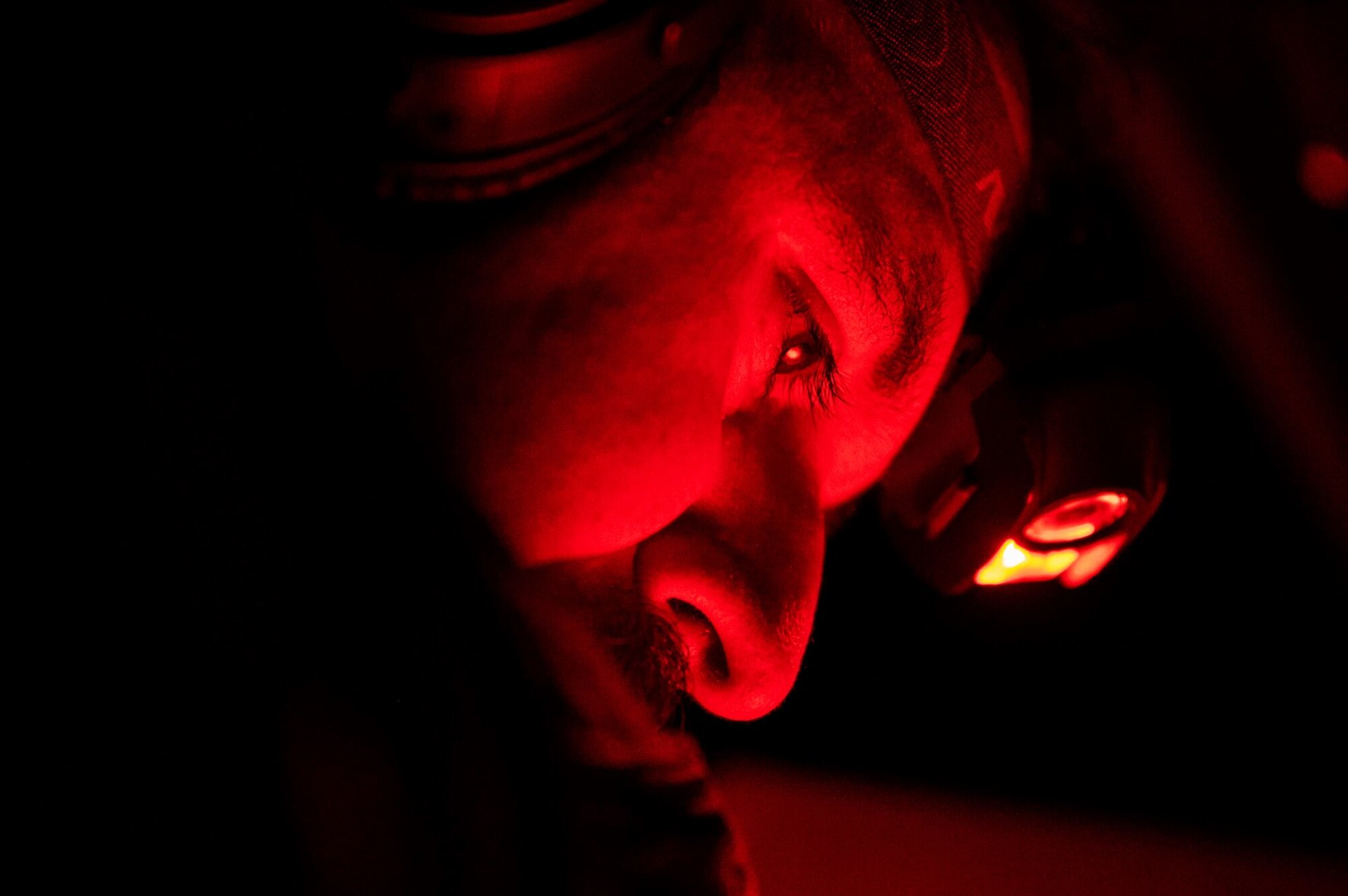 A U.S. Air Force B-52H Stratofortress aircrew member, assigned to the 20th Bomb Squadron, Barksdale Air Force Base, Louisiana, conducts checks during a Bomber Task Force mission, Sept. 9, 2021, over the Indo-Pacific region. The bombers are operating out of Andersen Air Force Base, Guam during their deployment. Andersen acts as a staging point for the B-52, allowing commanders to address a variety of global challenges through the engagement of the bomber. (U.S. Air Force photo by Staff Sgt. Devin M. Rumbaugh)