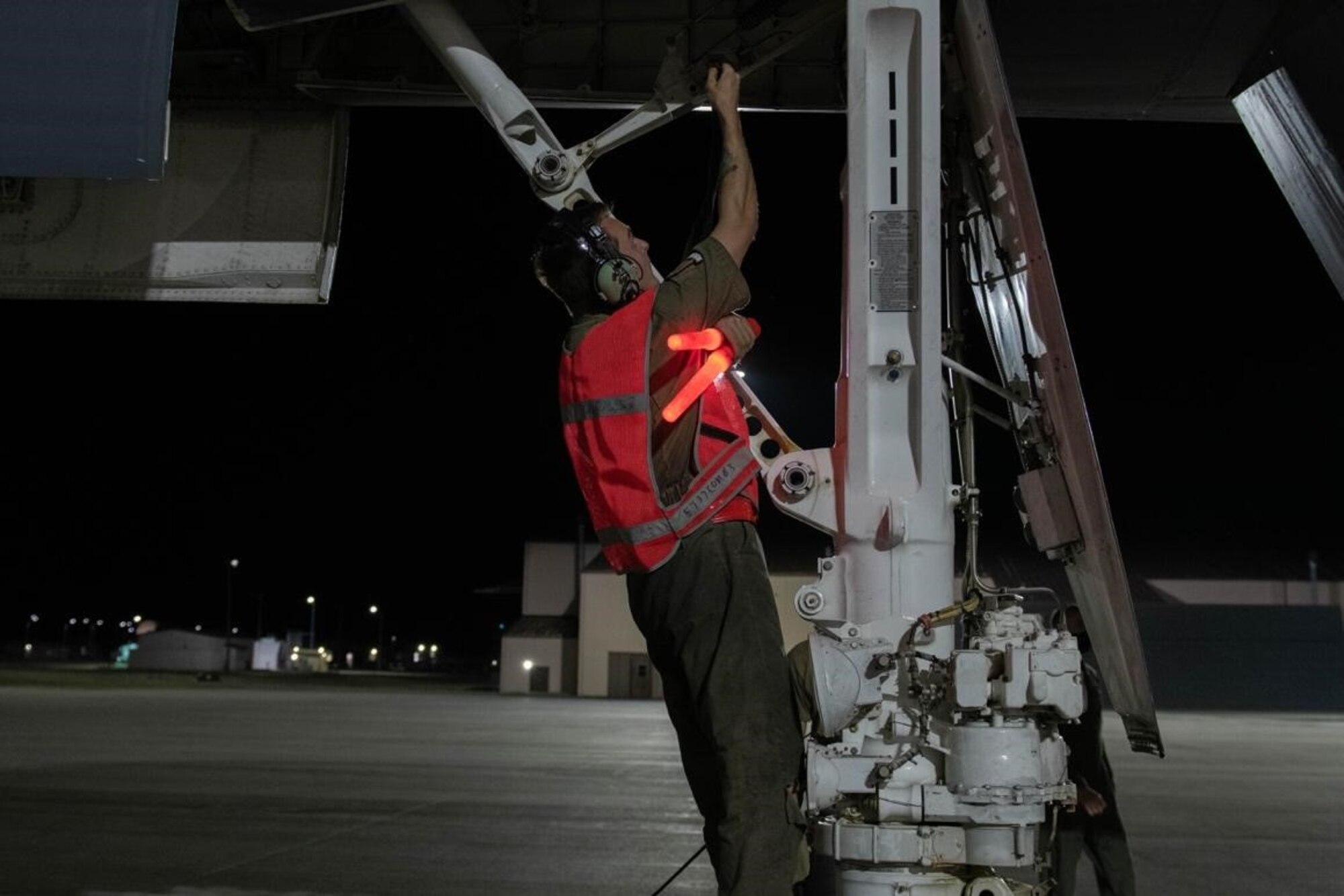 U.S. Air Force Senior Airman Cambron Reinhardt, 28th Aircraft Maintenance Squadron crew chief, secures the nose landing gear on a B-1B Lancer upon return from a Bomber Task Force mission at Ellsworth Air Force Base, S.D., Sept. 8, 2021.