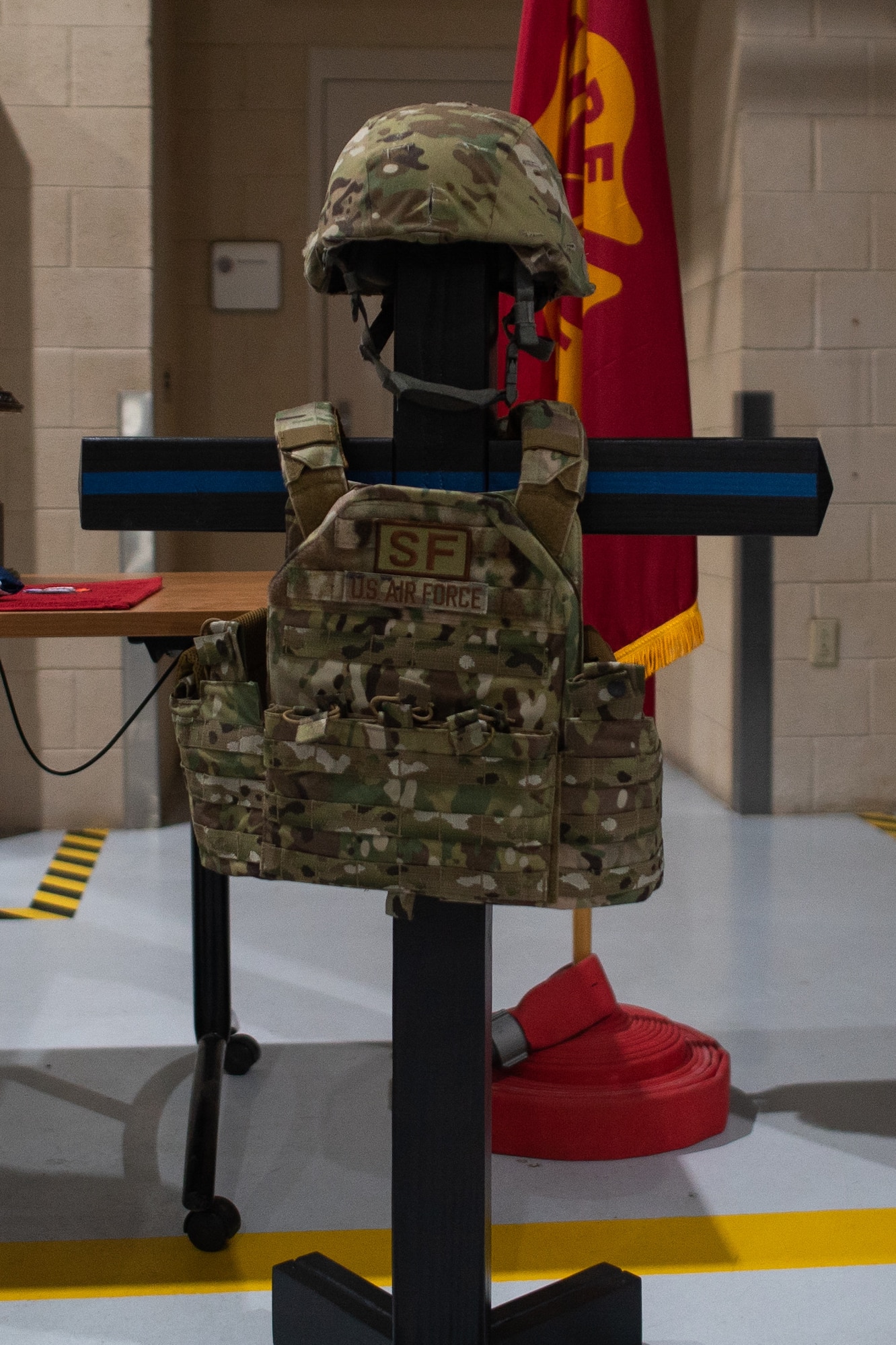 The 27th Special Operations Security Forces Squadron memorial dedicated to Security Forces Defenders lost in the line of duty stands erect during the 9/11 memorial climb ceremony at Cannon Air Force Base, N.M., Sep. 11, 2021. The memorial marked the 20th anniversary since the terrorist attacks on the United States in 2001 and included a nine-story stair climb in honor of the first responders who lost their lives responding to the attacks. (U.S. Air Force photo by Senior Airman Christopher Storer)