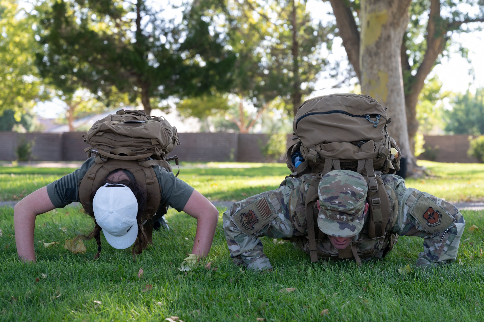 Team Kirtland Airmen perform push-ups for the 20th anniversary of 9/11.