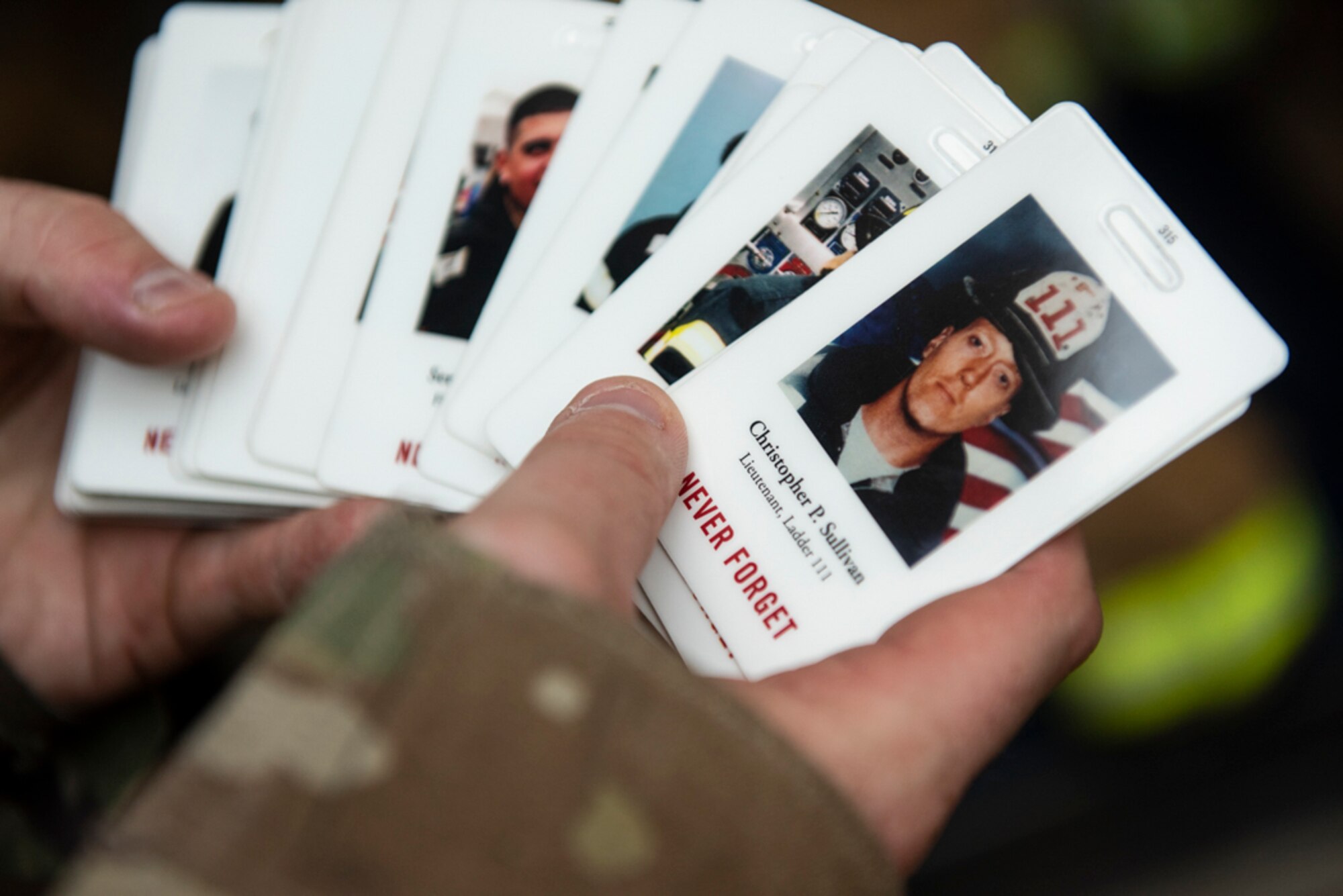 Participants carried one of these cards during each of their stair climbs to honor a first responder during a 20th Anniversary 9/11 Remembrance Ceremony at Osan Air Base, Republic of Korea, Sept. 11, 2021.