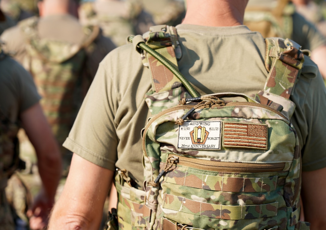 The 403rd Wing hosted a 20th Anniversary 9/11 Memorial Ruck March in rembrance of those who lost their lives during the events of 9/11. The march was led by the 403rd Security Forces Squadron and was open to all members of Keesler Air Force Base, both military and civilian. (U.S. Air Force photo by 2nd Lt. Christopher Carranza)