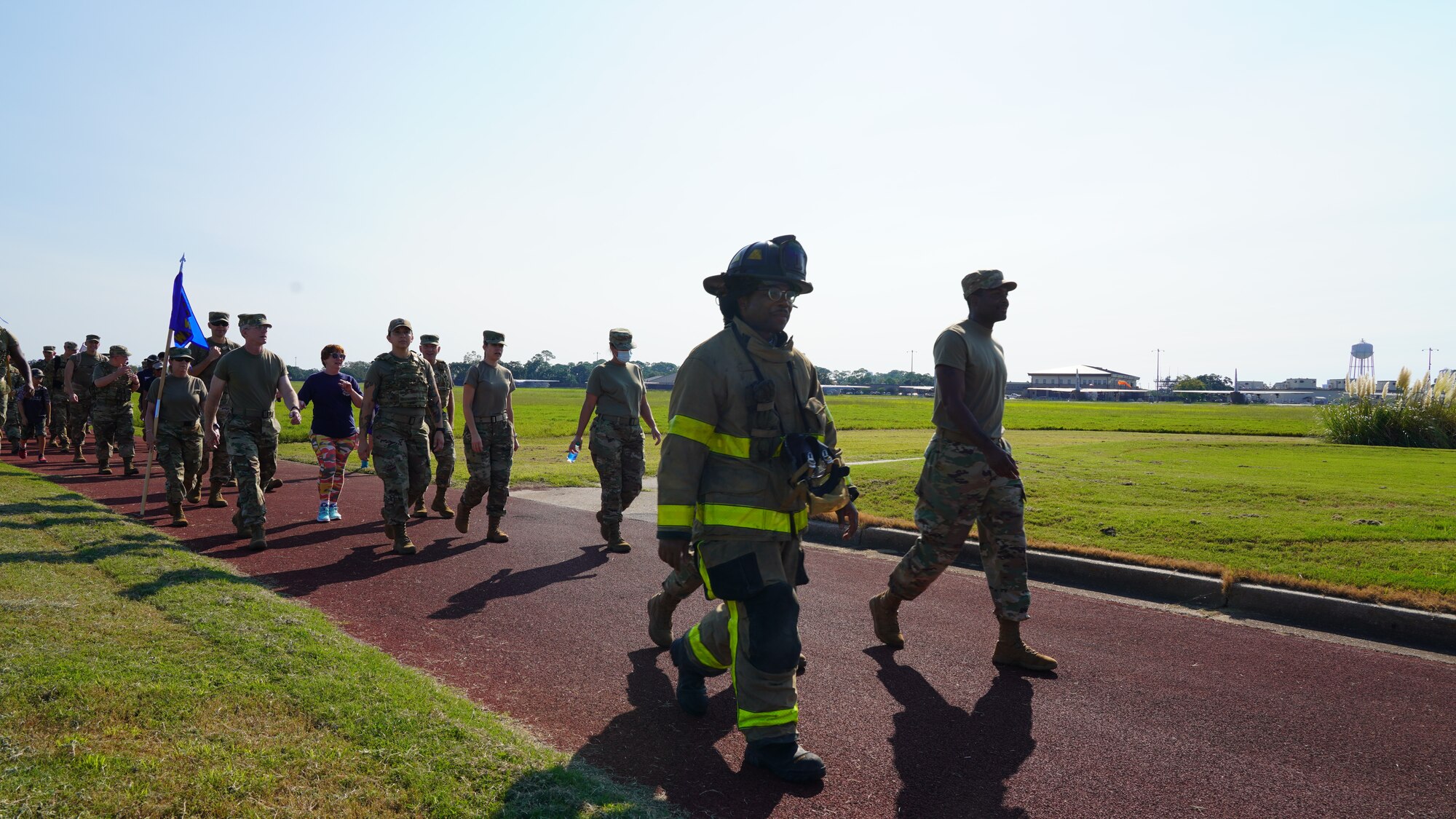 Tech. Sgt. James Haymer, civilian firefighter and traditional reservist with the 403rd Logistics Readiness Squadron, completed the ruck march in his fire fighter gear for the 403rd Wing's 20th Anniversary 9/11 Memorial Ruck March, which was hosted in rembrance of those who lost their lives during the events of 9/11. The march was led by the 403rd Security Forces Squadron and was open to all members of Keesler Air Force Base, both military and civilian. (U.S. Air Force photo by 2nd Lt. Christopher Carranza)