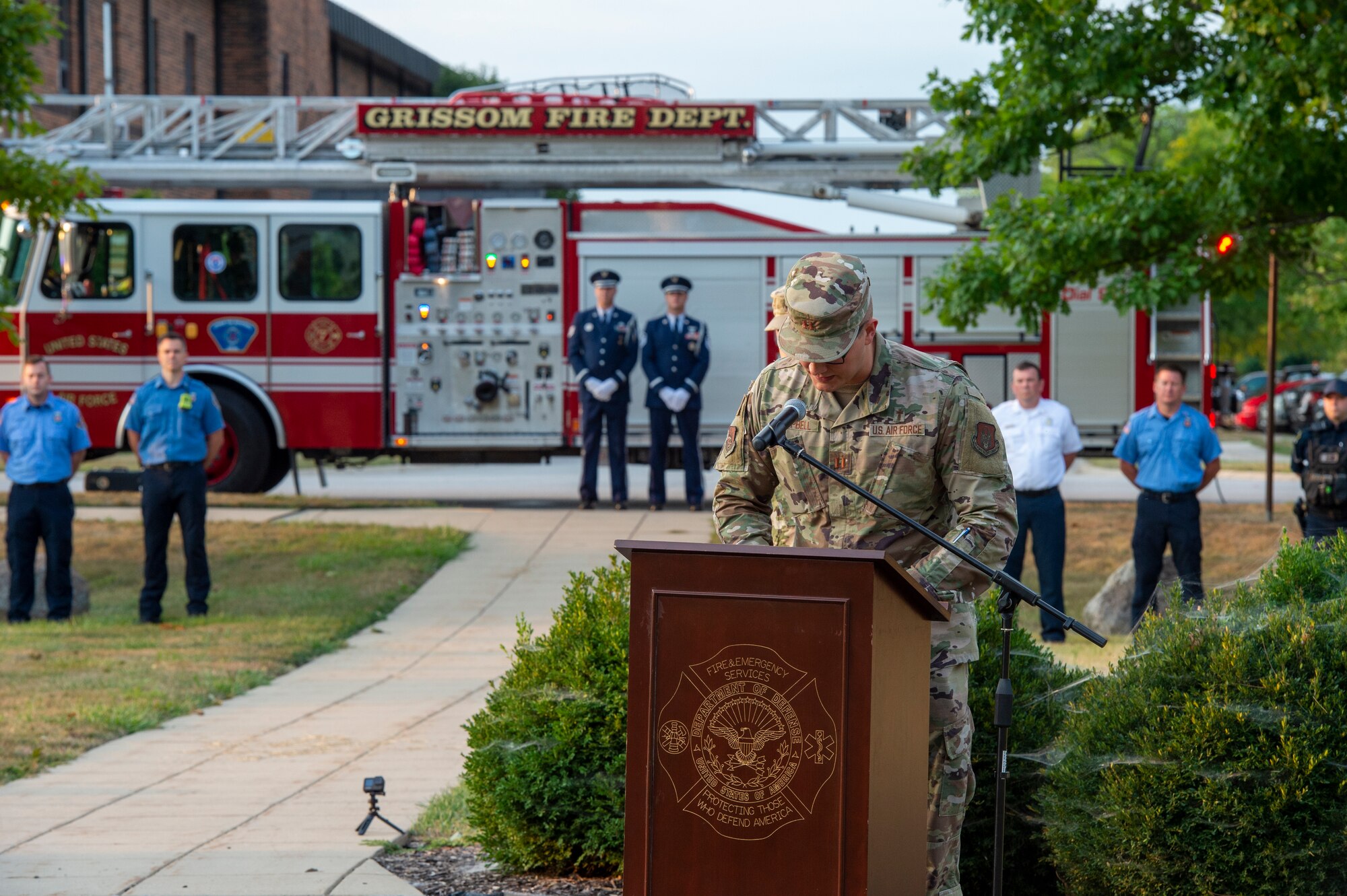 Capt. Blake Campbell, 434th Air Refueling Wing chaplain, speaks during a 9/11 remembrance ceremony at Grissom Air Reserve Base, Indiana, Sept. 11, 2021.  Campbell spoke on the events that transpired 20 years ago and delivered a prayer for those who lost their lives as well as the families affected that day. (U.S. Air Force photo by Staff Sgt. Michael Hunsaker)