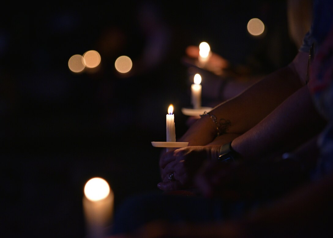 Members of the San Angelo community took a moment of silence during the 9/11 Remembrance Ceremony at the Bill Aylor Sr. Memorial RiverStage in San Angelo, Texas on Sept. 11, 2021. Members from the San Angelo community gathered on the 20th anniversary of Sept. 11, 2001, to honor and remember not just the first responders, but the innocent civilians who paid the ultimate sacrifice 20 years ago. (U.S. Air Force photo by Senior Airman Ashley Thrash)