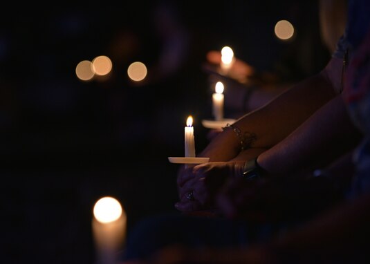 Members of the San Angelo community took a moment of silence during the 9/11 Remembrance Ceremony at the Bill Aylor Sr. Memorial RiverStage in San Angelo, Texas on Sept. 11, 2021. Members from the San Angelo community gathered on the 20th anniversary of Sept. 11, 2001, to honor and remember not just the first responders, but the innocent civilians who paid the ultimate sacrifice 20 years ago. (U.S. Air Force photo by Senior Airman Ashley Thrash)