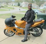 Picture of Chief Master Sgt. Lorna Major with her motorcycle.  Majors joined the 931st Air Refueling Wing as command chief during the September Unit Training Assembly.