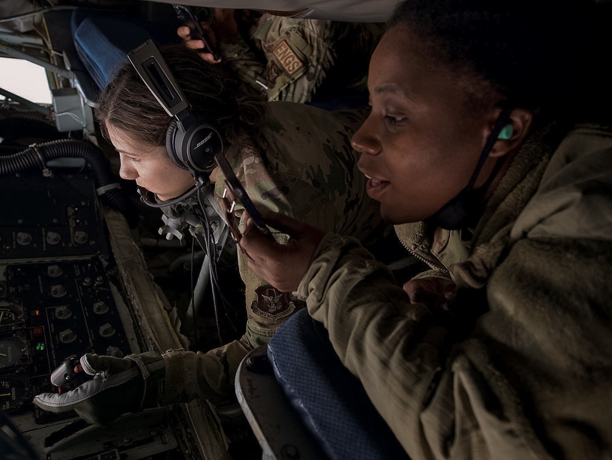 U.S. Air Force Airmen with the 927th Air Refueling Wing, Florida, watch an F-16 Fighting Falcon with the 482nd Fighter Wing, Florida, get refueled by a KC-135 Stratotanker with the 927th ARW on September 11, 2021.  As quarterly or annual award winners, the Airmen were able to see how their efforts contribute to the Wing’s primary mission first hand.  (U.S. Air Force photo by Staff Sgt. Tiffany A. Emery)