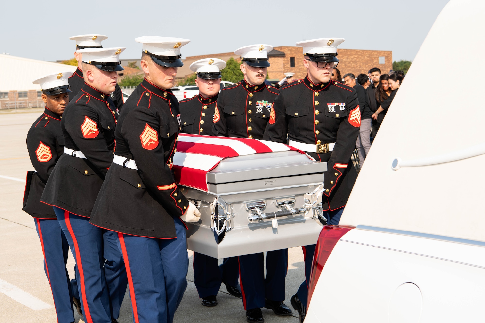 Marines from Detachment 1, Communications Company, Combat Logistics Regiment 45, 4th Marine Logistics Group, carry the casket of U.S. Marine Corps Cpl. Humberto A. Sanchez of Logansport, Indiana, Sept. 12, 2021 at Grissom Air Reserve Base, Indiana. Sanchez was assigned to 2nd Battalion, 1st Marine Regiment, 1st Marine Division, I Marine Expeditionary Force, Camp Pendleton, California. (U.S. Air Force photo by Master Sgt. Benjamin Mota)