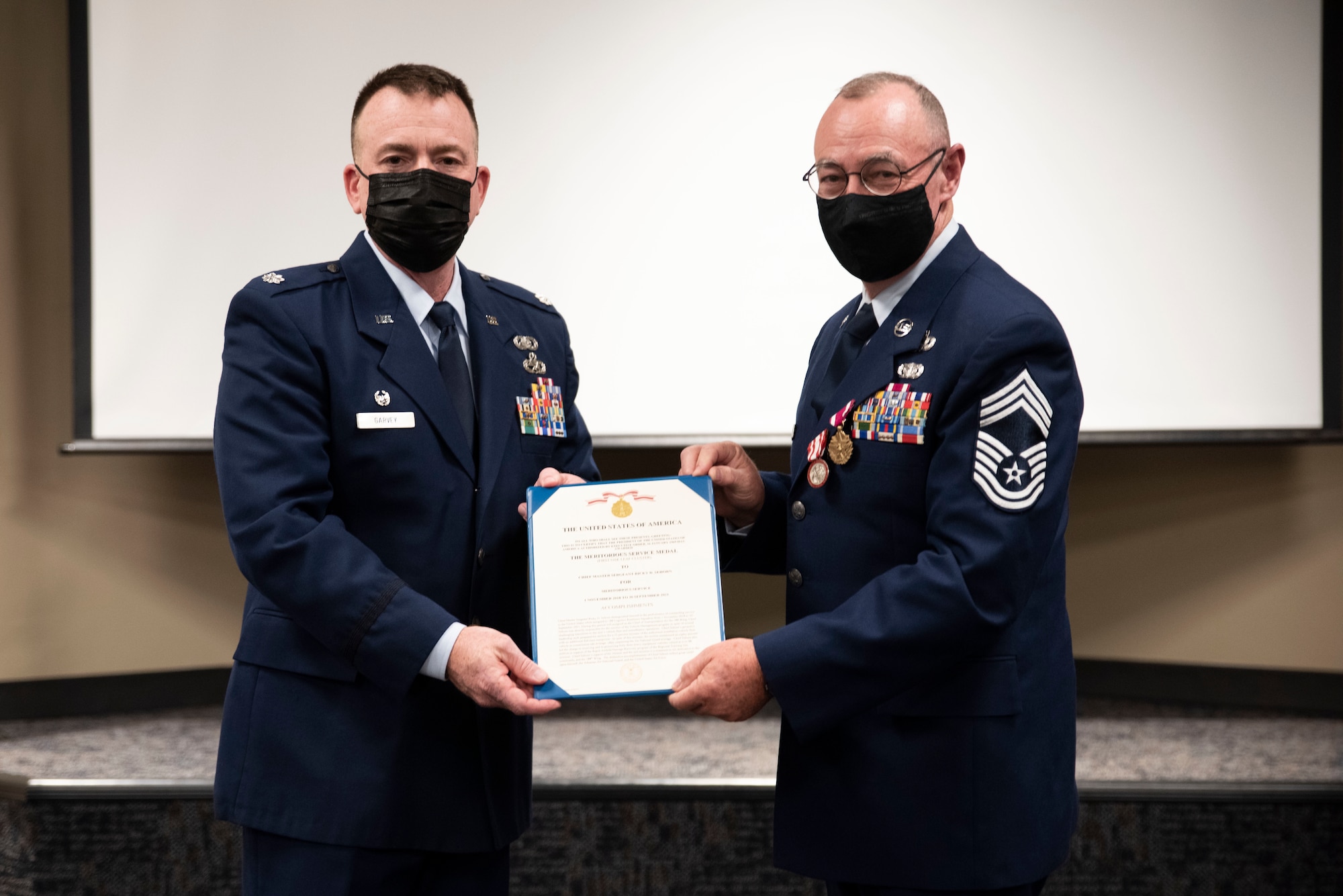 Lt. Col. James T. Garvey presents Chief Master Sgt. Ricky D. Sehorn with the Meritorious Service Medal, first oak leaf cluster, at his retirement ceremony held on September, 11, 2021, at Ebbing Air National Guard Base, AR. Sehorn’s career spanned more than 36 years in the United States armed forces including the Army and Air National Guard.